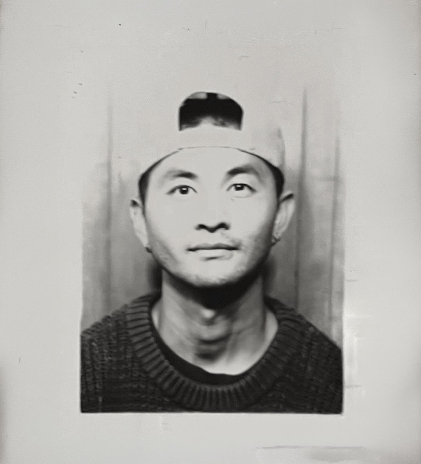 Black-and-white portrait of Jared Fujikuni